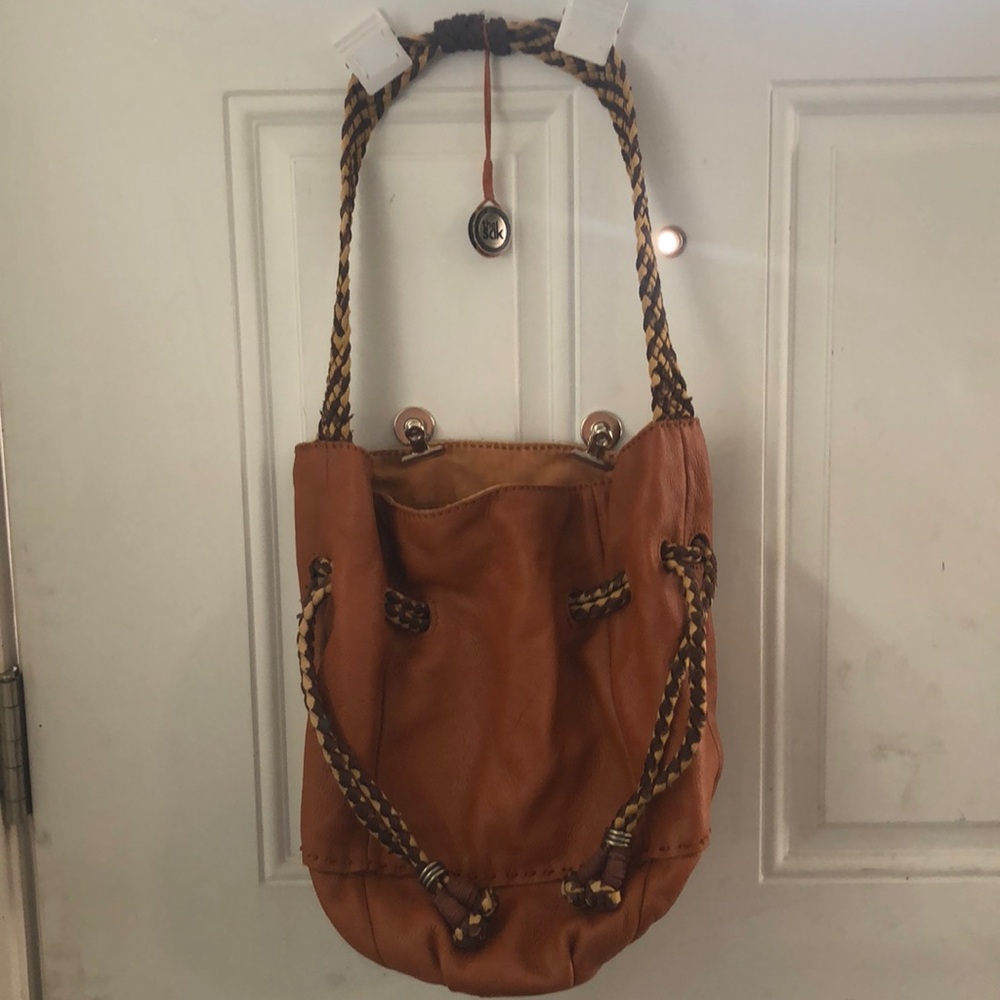 The Sak Leather two tone shoulder bag w/rope strap.